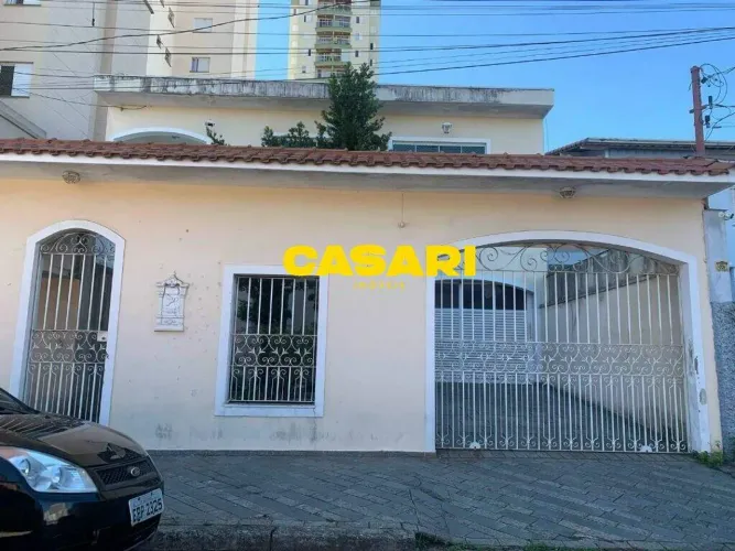 Sobrado à venda ou aluguel na Vila Scarpelli | 3 dormitórios, piscina e 423 m² em Santo An