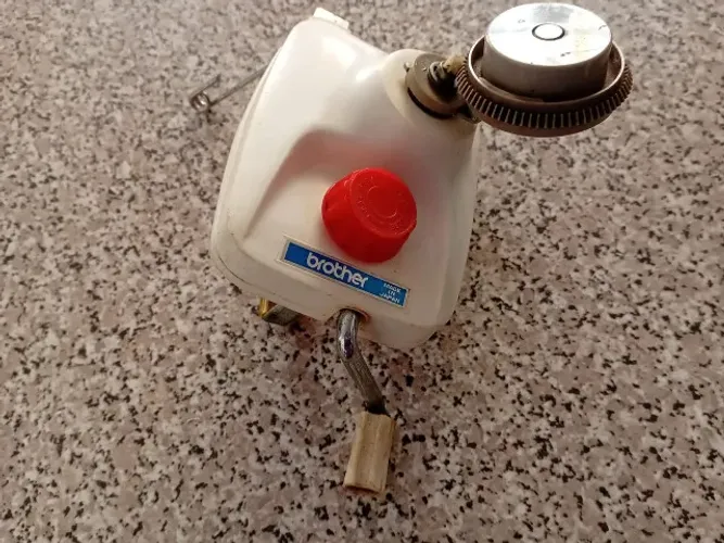 Enrolador de fios manual