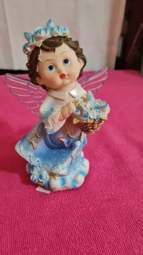 Linda anjo de resina ,não ascende.