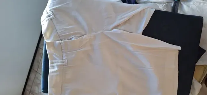 Bermuda branca plus size Tam 50 semi nova