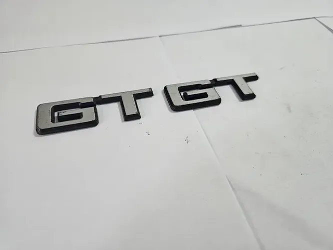 Corcel 2 GT emblema GT tampa traseira novo original ford