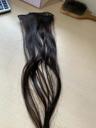 Aplique de cabelo preto