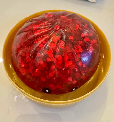 Dumpling squishy Glitter vermelho 
