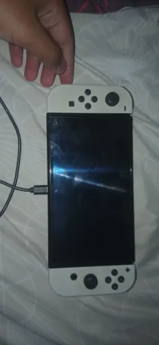 Nintendo switch oled aceito trocas com outros consoles
