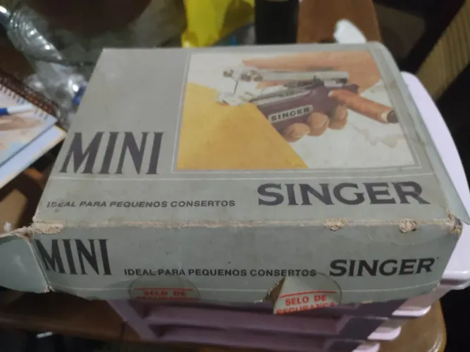 Maquina de costura manual singer