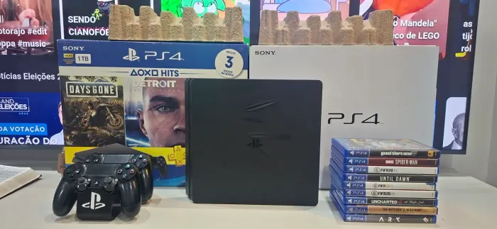 PS4 SLIM 1TB + 2 CONTROLES + 9 JOGOS + CAIXA