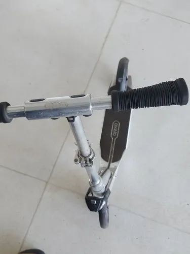 Patinete Oxelo dobrável.