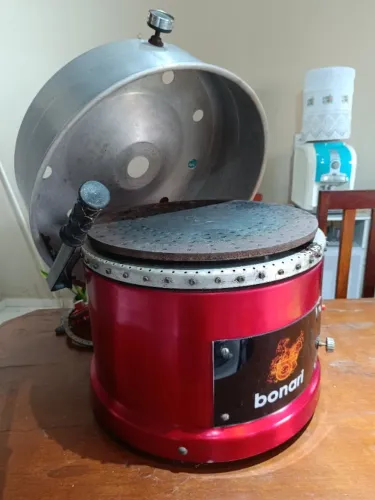 Forno compacto de pizzas.