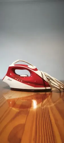 Ferro de Passar a Vapor Oster Compacto 1400W - Motivo Mudança de Estado