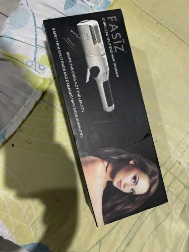 Fasiz máquina de corte bordado está sem o carregador.