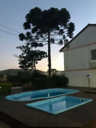 Excelente Residência em condomínio no Bairro Santo Antônio, com 3 dormitórios.