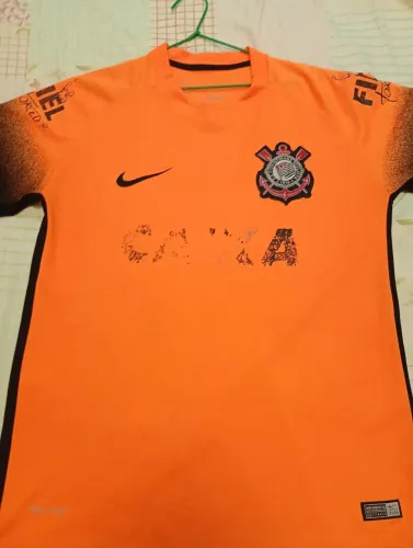 Camisa do Corinthians Caixa Fiel torcedor na cor laranja.