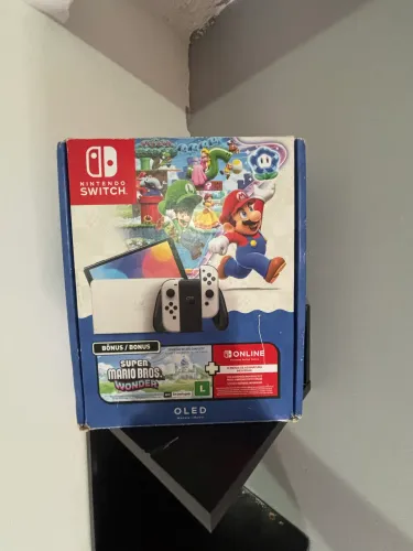 Nintendo switch oled 64 gb com caixa e 2 pares de joycon em perfeito estado
