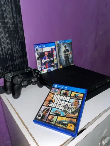 Ps4 slim,1 tb é 1 jogo e 2 manetes