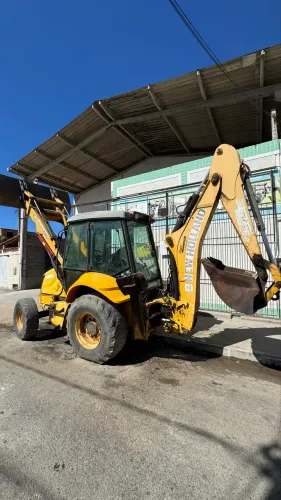 Vendo retroescavadeira New holland