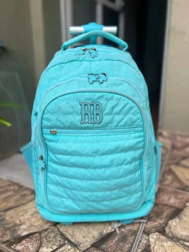 Mochila Rebeca bonbon com rodinha + estojo Lilica
