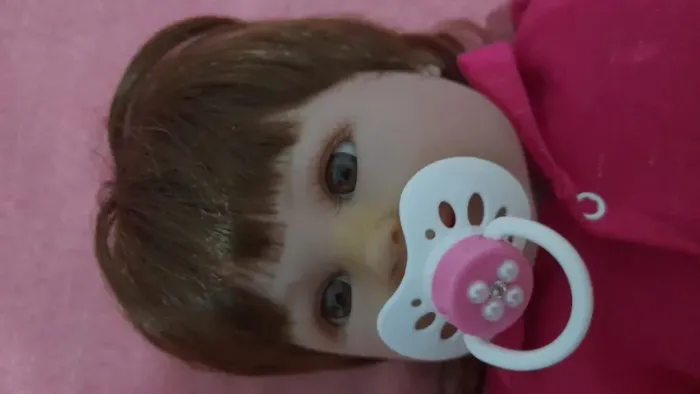 boneca bebe reborn com chupeta