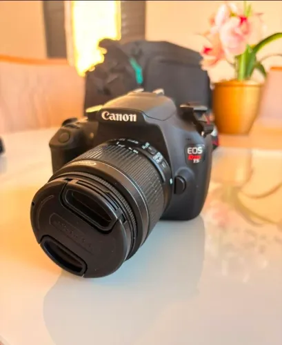 Filmadora e maquina fotografica