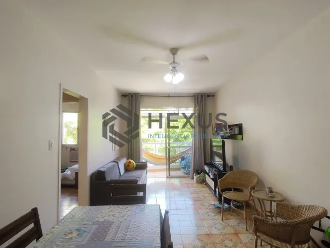 Apartamento com varanda a duas quadras da Praia do Tombo, Guaruja
