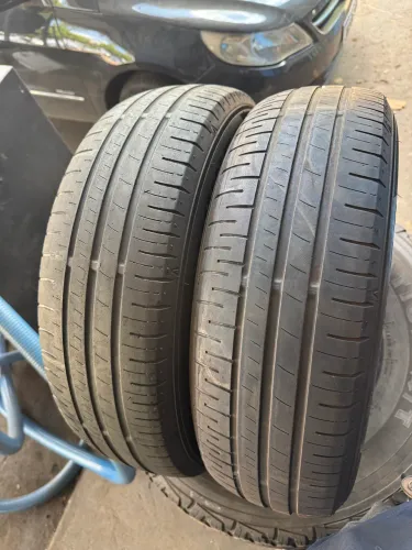 Par de Pneus aro 14 185/70 r14 dunlop sp touring r1 88t, meia vida