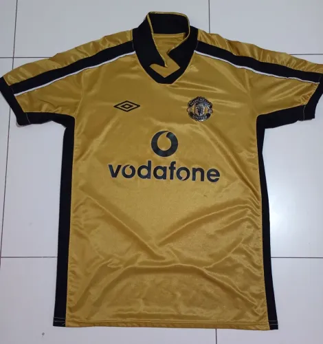 Camisa do Manchester United dourada