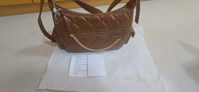 Bolsa arezzo na cor marrom com alça lateral nunca usada