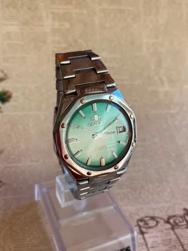 Relogio Orient Verde claro 