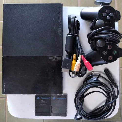 PS2:Tudo Original/FuncionandoTUDO/Bolsa viagem Leitor, 1 memory e cabos originais "VENDA"
