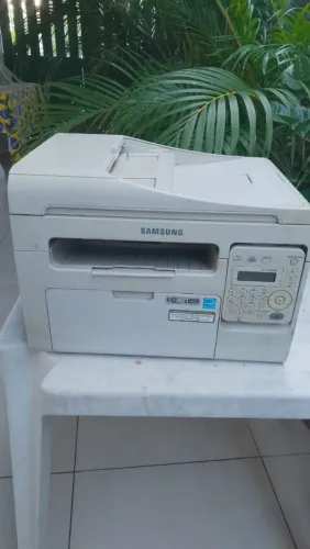 Impressora Com pequeno defeito.