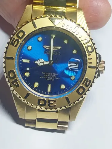 INVICTA QUARTZ DOURADO.