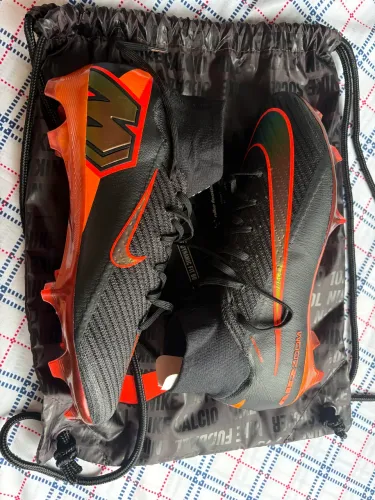 Chuteira campo Nike Air Zoom Mercurial Vapor 16 Elite FG - Cano alto (Laranja e Preta)