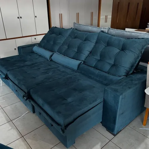 Sofá retrátil e reclinável azul turquesa