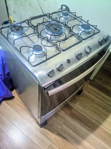 Vendo fogão 5 bocas Mueller espelhado usado funcionando leia