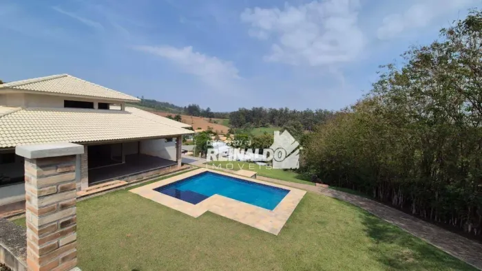 Casa com 4 dormitórios à venda, 248 m² por R$ 1.100.000,00 - Condomínio Cachoeiras do Imar