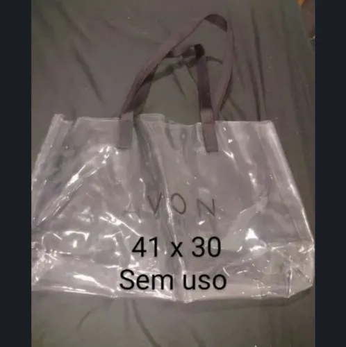 Bolsa transparente marca Avon