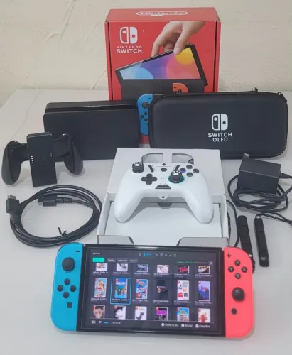 Nintendo Switch OLED desbloqueado Impecável com Central de Jogos + Controle extra + Caixa