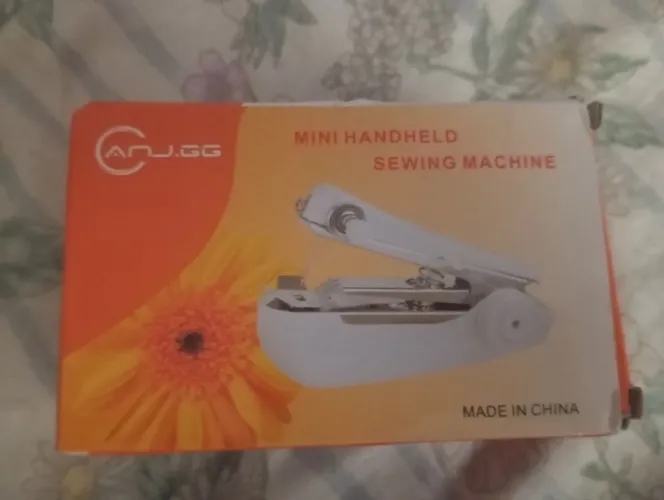 Máquina de costura portátil manual