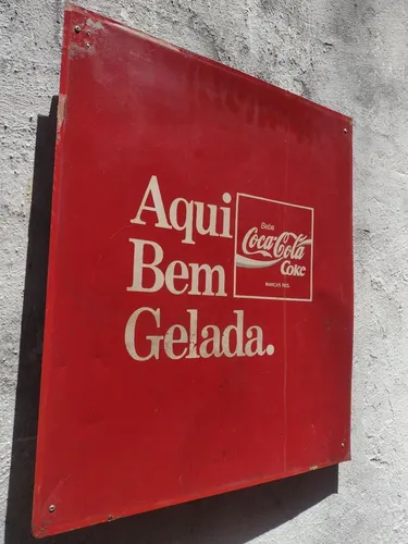 Placa antiga de ferro coca cola