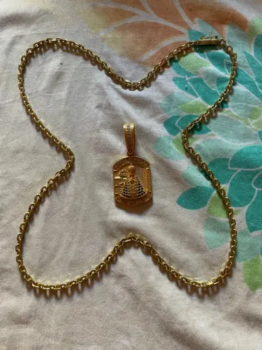 Corrente e pingente banhados a ouro / quero 350 reais