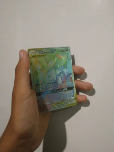 Carta de pokémon tag tem raibow