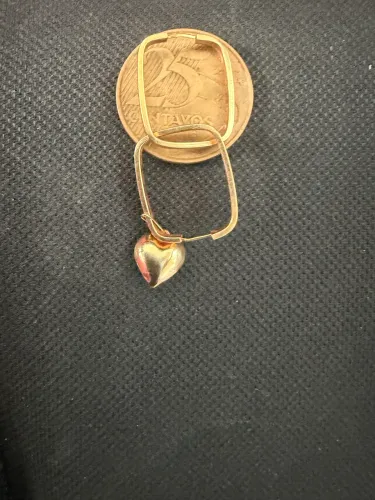 Vendo argola de ouro com Pigente 750,00