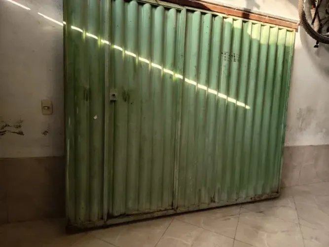 Portão de garagem com portão social