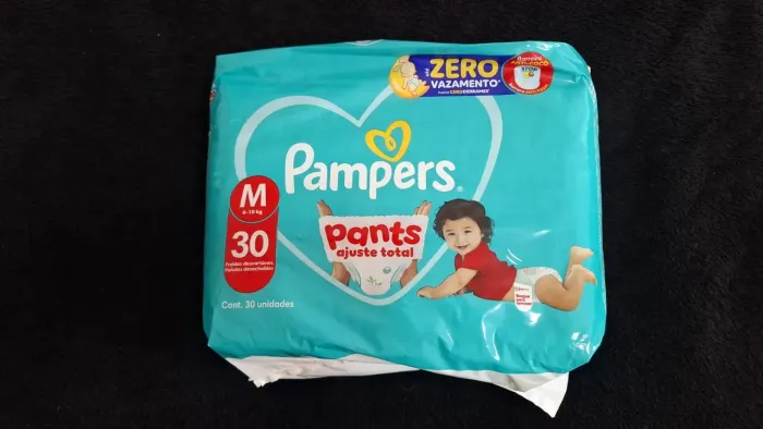 Fralda Pampers tamanho M e G - $45,00 cada pacote