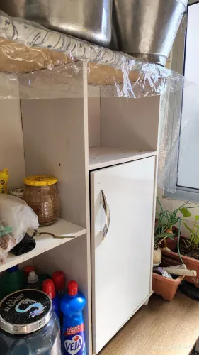 Armário com tábua de passar