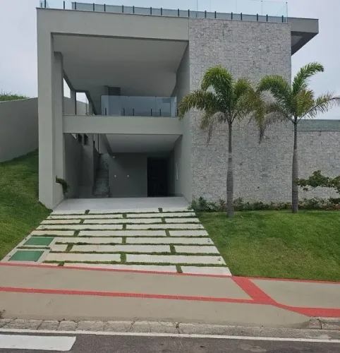 A casa Cond. Riviera Park alto padrão.