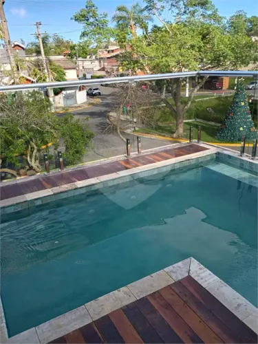 Casa à venda com 4 quartos, sendo 3 suítes, no condomínio Residencial Real Park Tietê, Mog