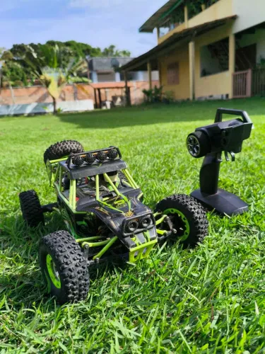 Carrinho de Controle Remoto WLtoys 12428 Verde Usado | Pronto para Diversão!