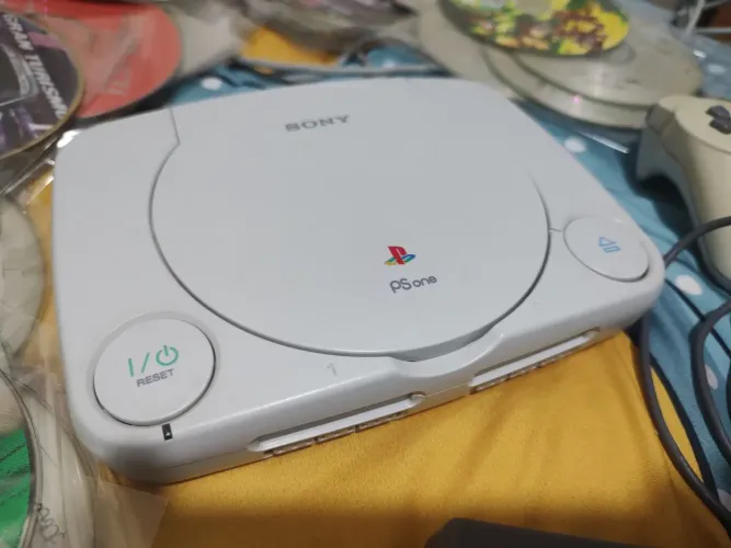 Playstation 1 baby completo lendo muito cd