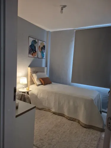 Quarto feminino de solteiro aconchegante para estudantes que esteja cursando 