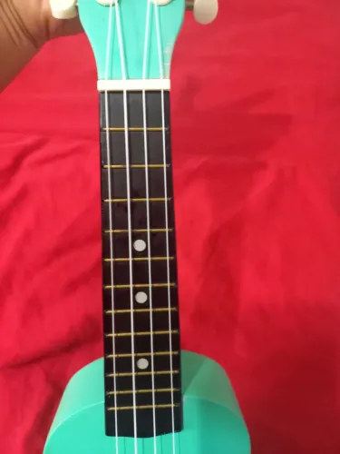 Okulele soprano azul ciano usado